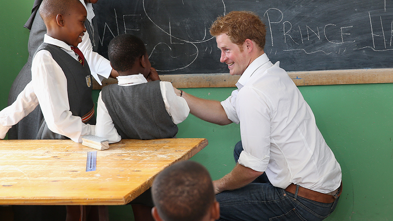 Illustration for article titled Your Boyfriend Prince Harry Grins His Way Through a Visit to Lesotho